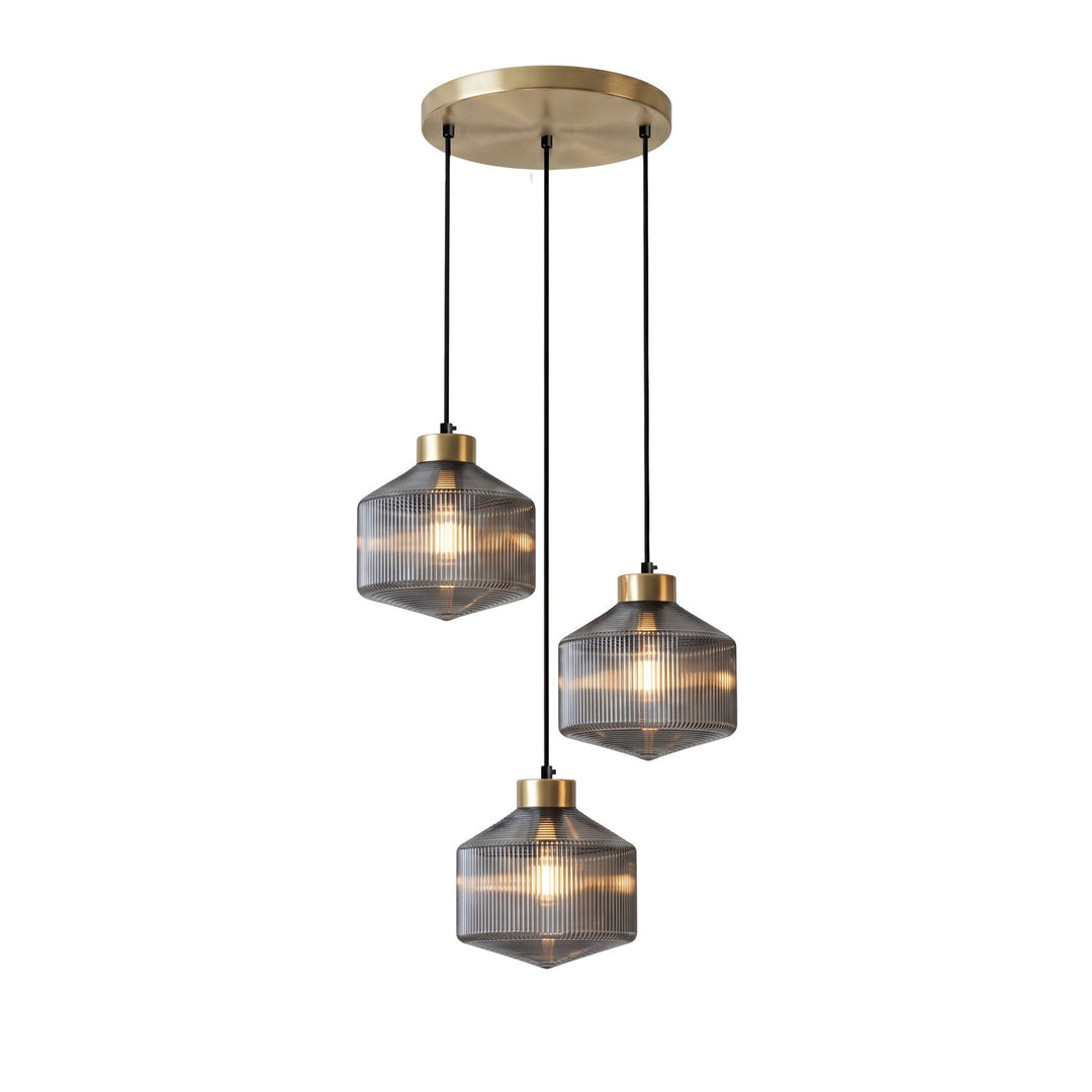 Lampa wisząca w kształcie wirującego bączka w paski