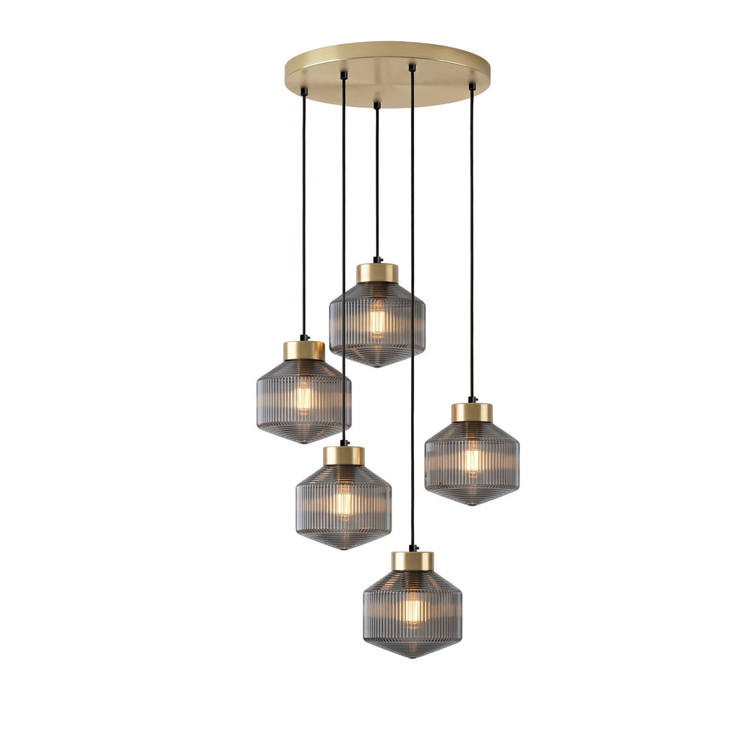 Lampa wisząca w kształcie wirującego bączka w paski