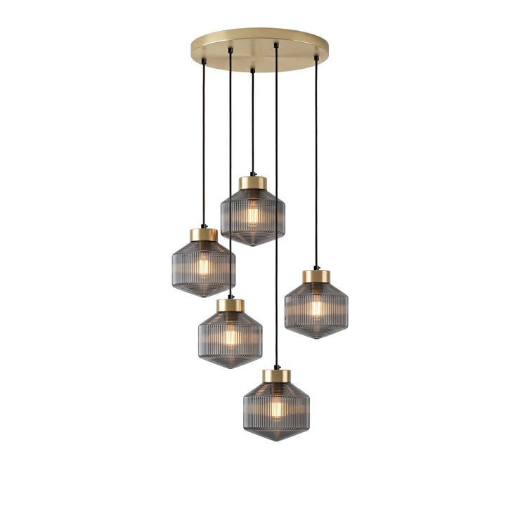 Lampa wisząca w kształcie wirującego bączka w paski