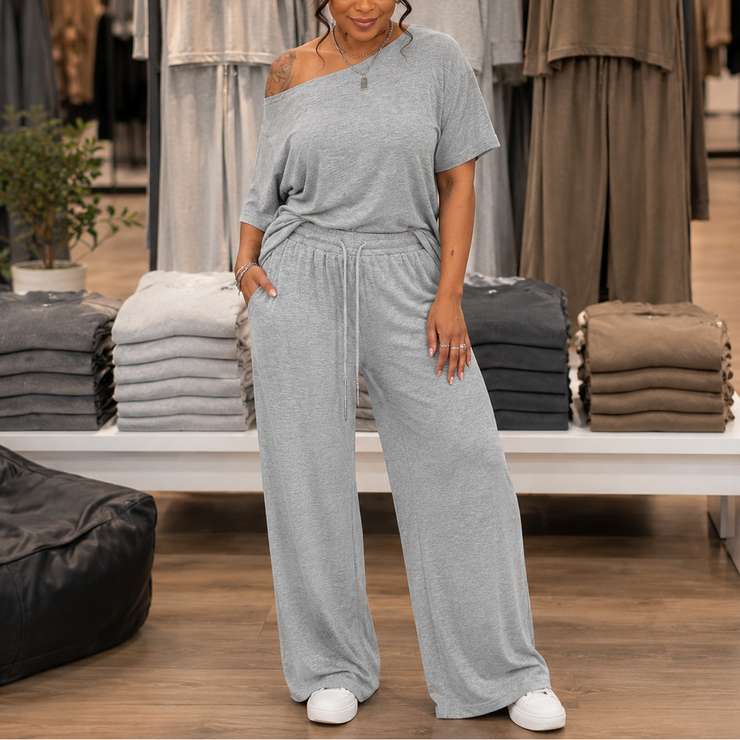 Draperline – Asymetryczna bluzka na jedno ramię i szerokie spodnie