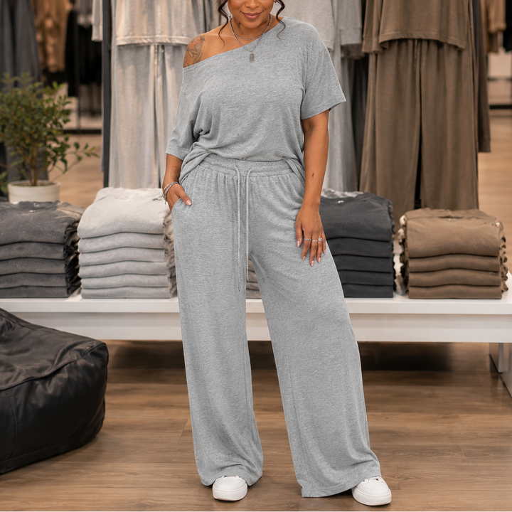 Draperline – Asymetryczna bluzka na jedno ramię i szerokie spodnie