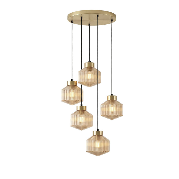 Lampa wisząca w kształcie wirującego bączka w paski