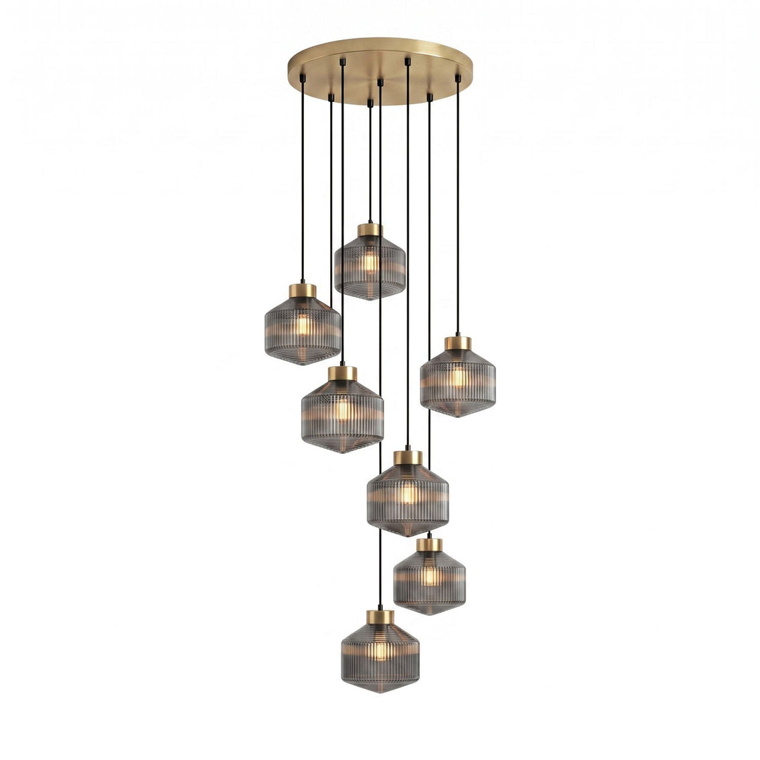 Lampa wisząca w kształcie wirującego bączka w paski
