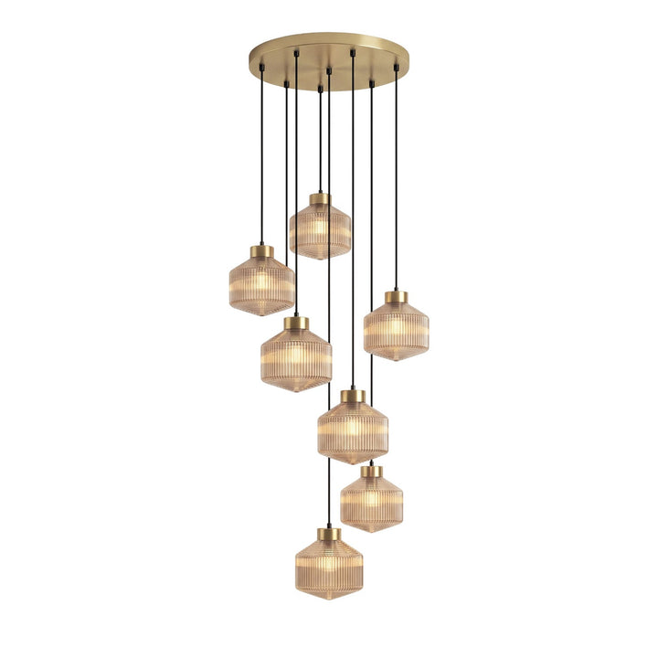 Lampa wisząca w kształcie wirującego bączka w paski