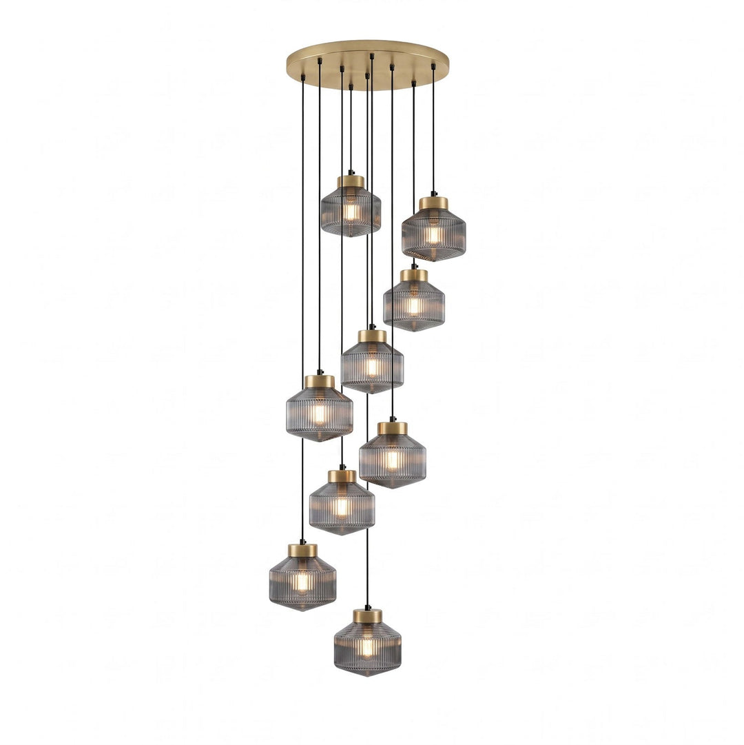 Lampa wisząca w kształcie wirującego bączka w paski