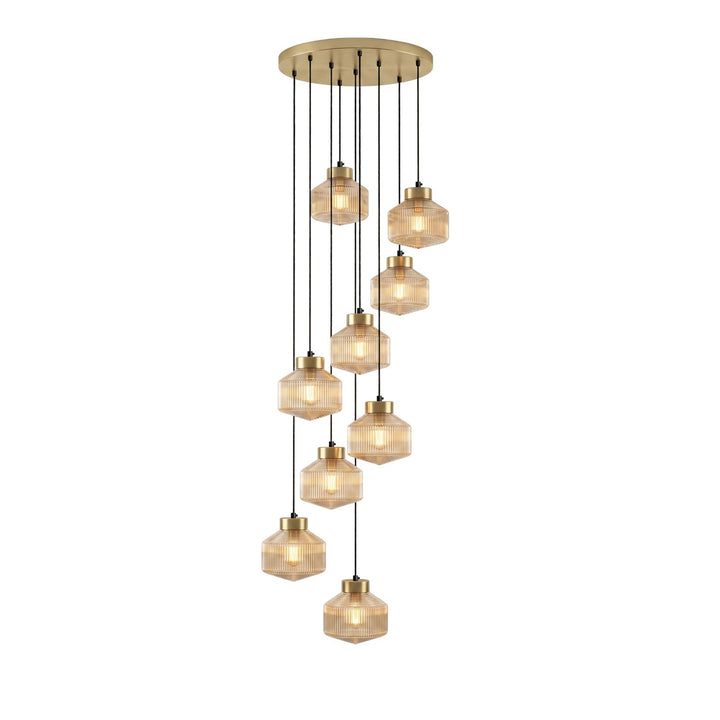 Lampa wisząca w kształcie wirującego bączka w paski