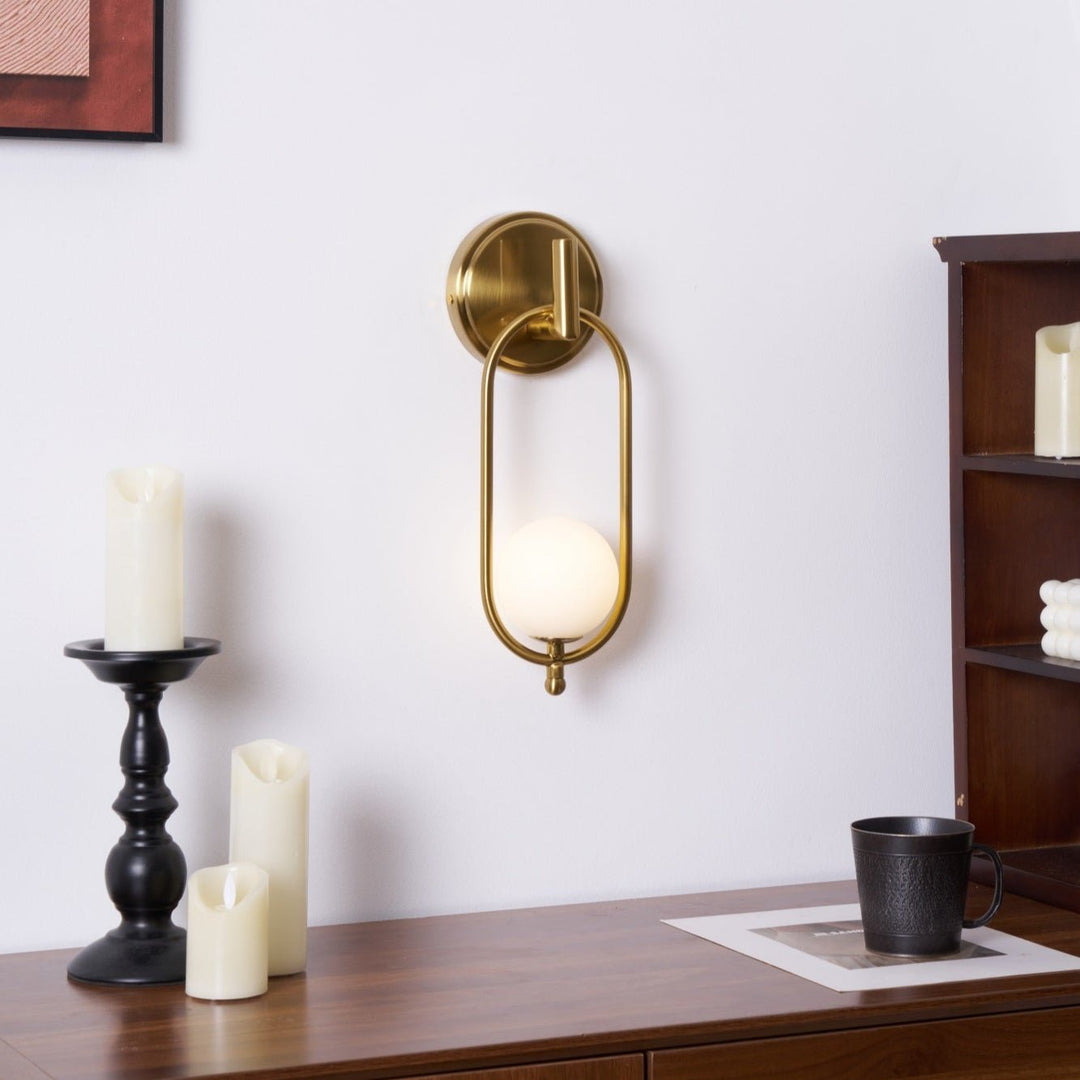 Mosiężna lampa ścienna Aurea
