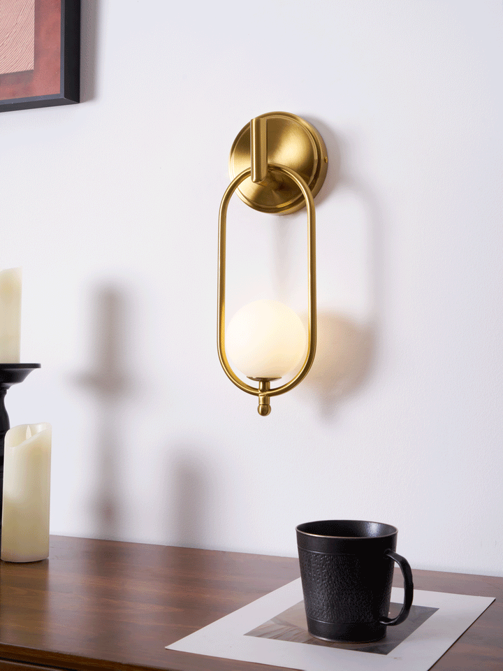 Mosiężna lampa ścienna Aurea