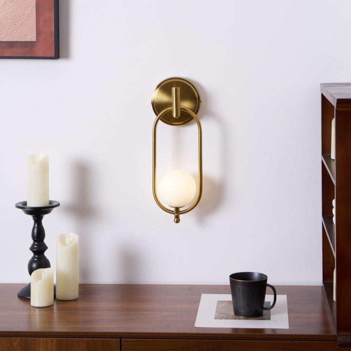 Mosiężna lampa ścienna Aurea