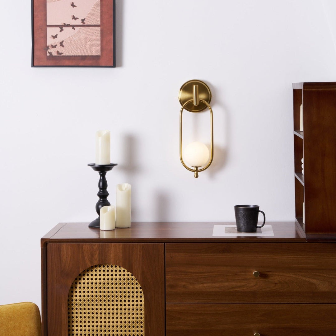 Mosiężna lampa ścienna Aurea