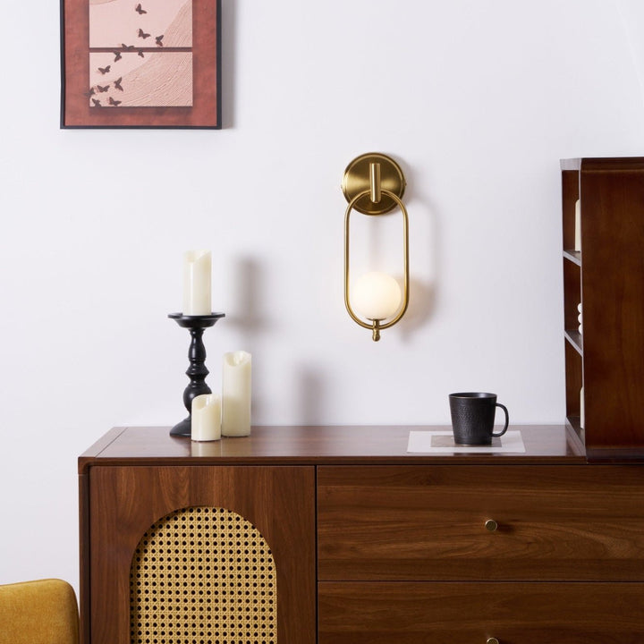 Mosiężna lampa ścienna Aurea