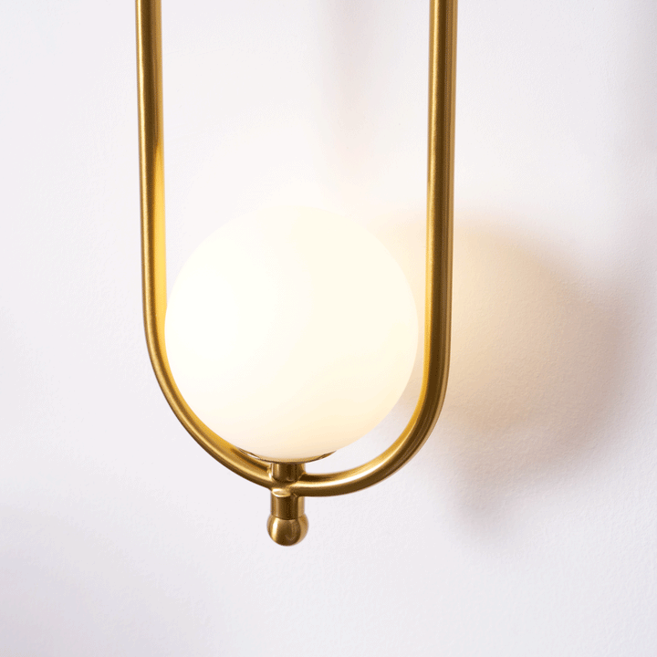 Mosiężna lampa ścienna Aurea