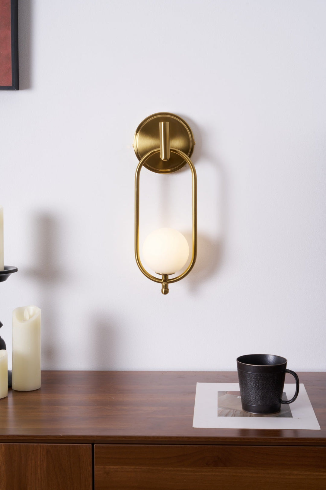 Mosiężna lampa ścienna Aurea