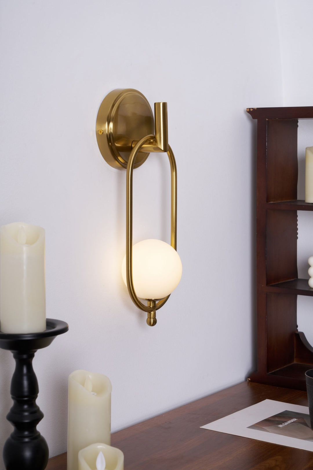 Mosiężna lampa ścienna Aurea