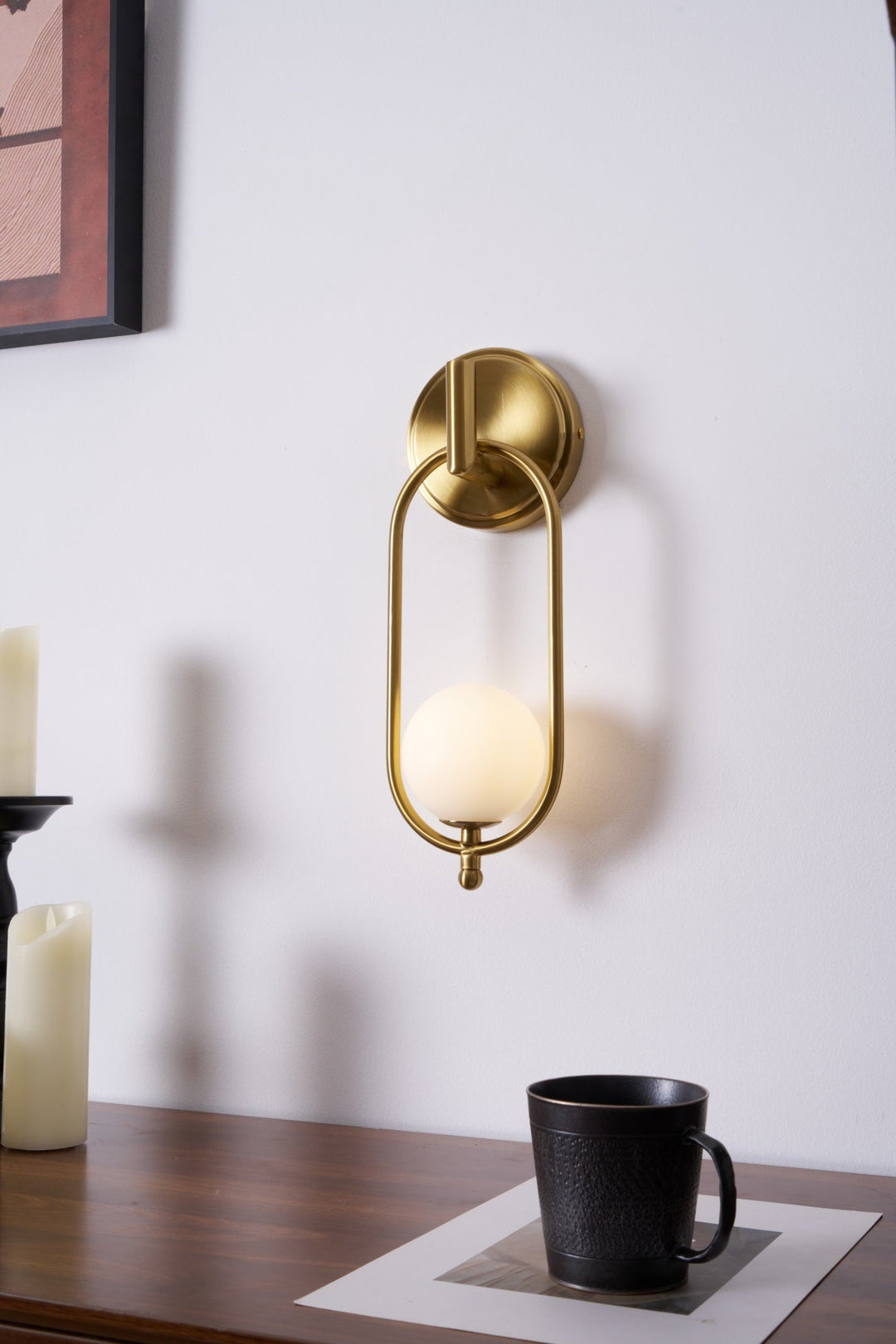 Mosiężna lampa ścienna Aurea