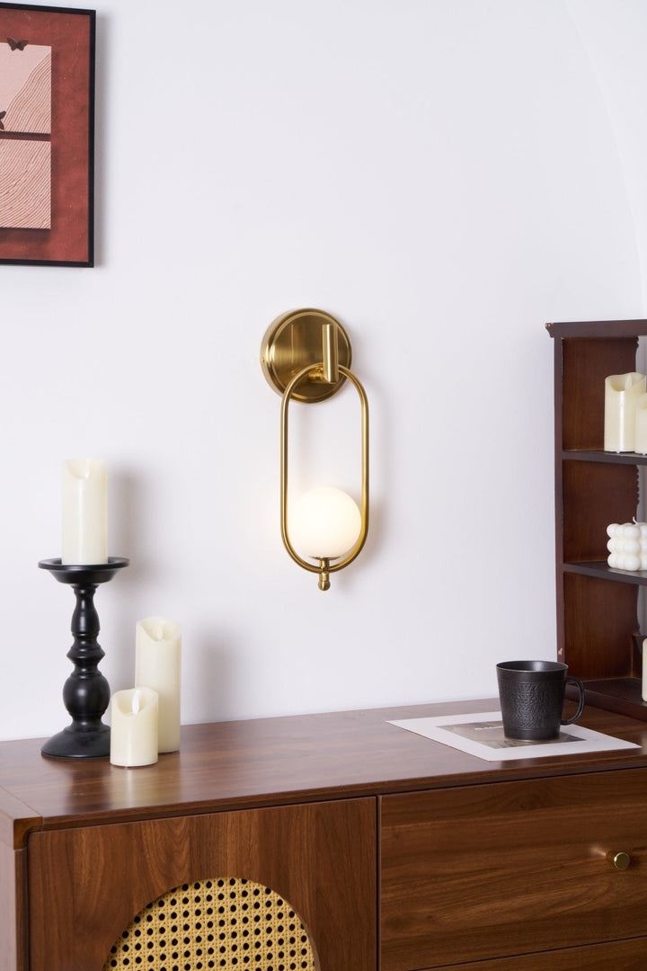 Mosiężna lampa ścienna Aurea