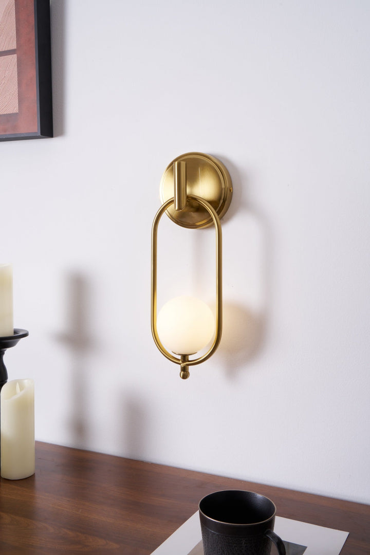 Mosiężna lampa ścienna Aurea