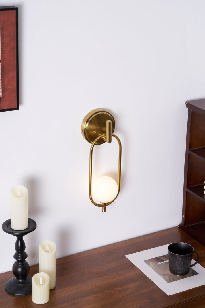 Mosiężna lampa ścienna Aurea