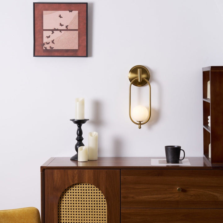 Mosiężna lampa ścienna Aurea