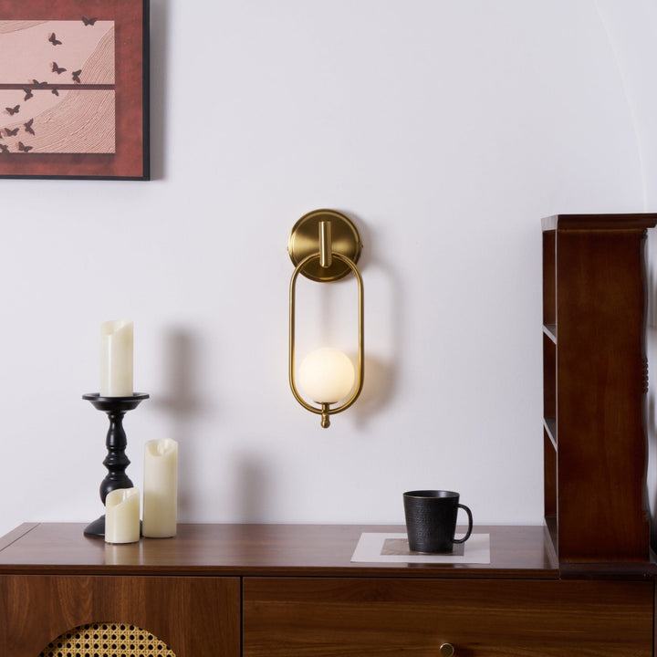 Mosiężna lampa ścienna Aurea