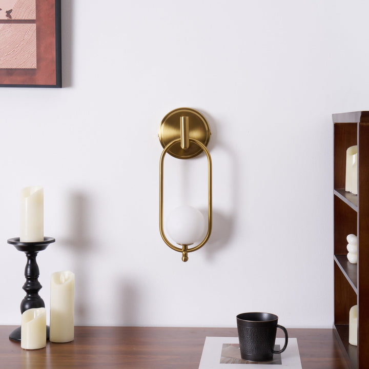 Mosiężna lampa ścienna Aurea