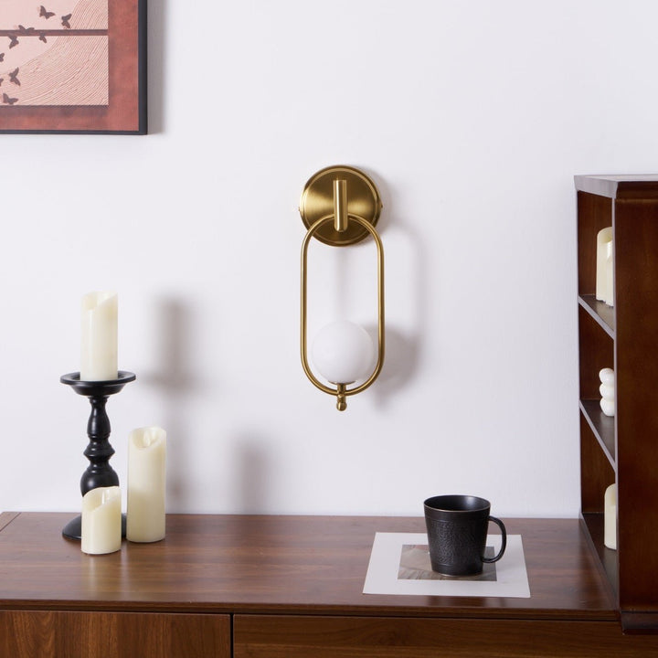 Mosiężna lampa ścienna Aurea