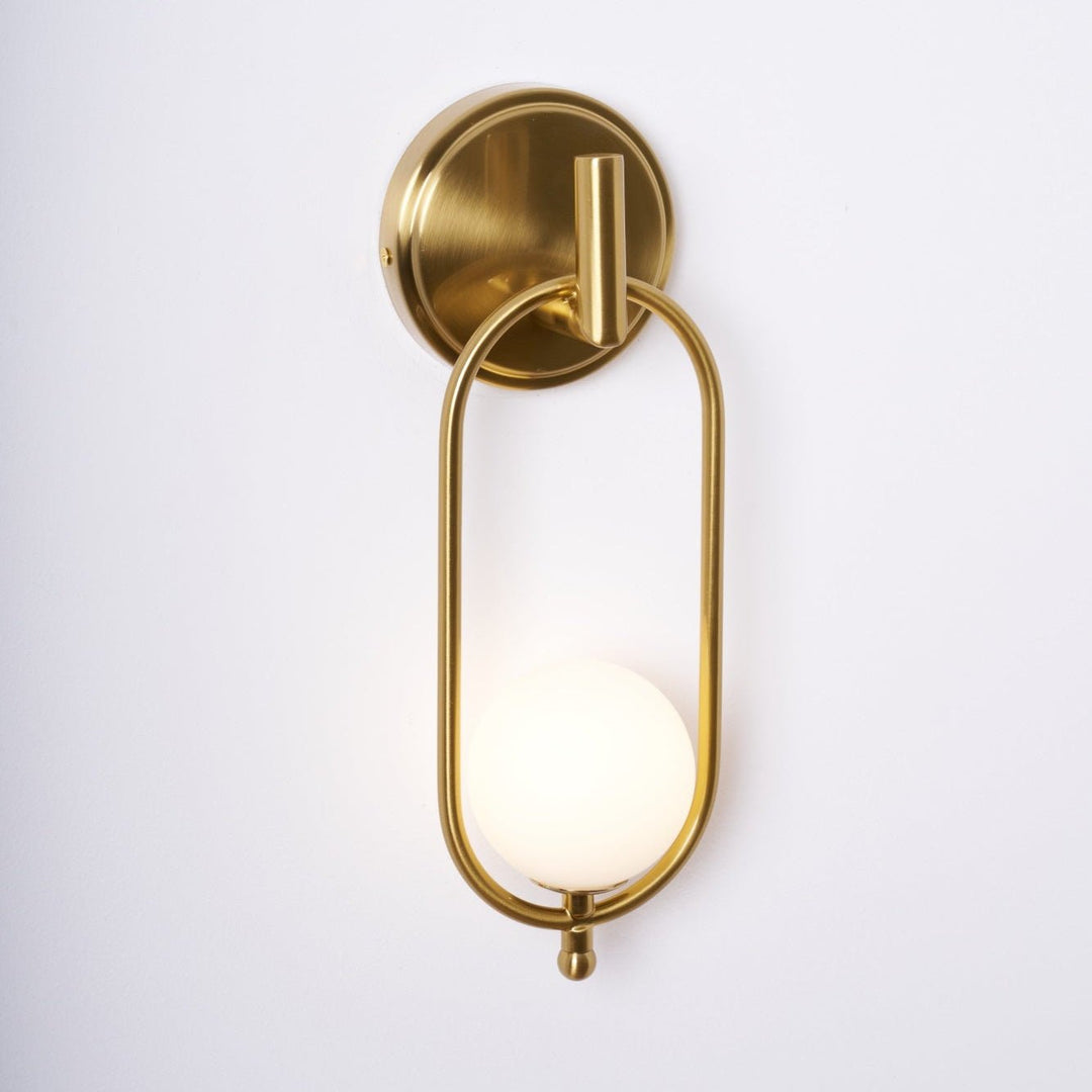 Mosiężna lampa ścienna Aurea