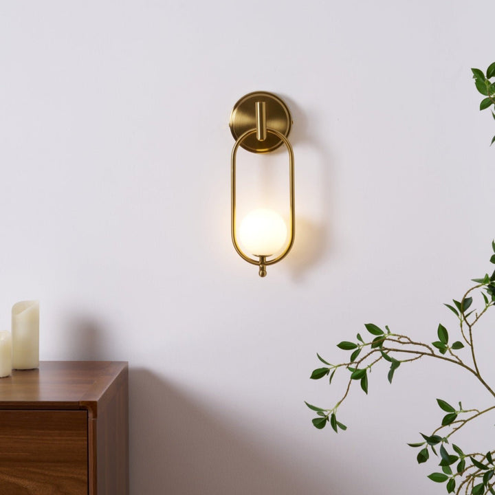 Mosiężna lampa ścienna Aurea