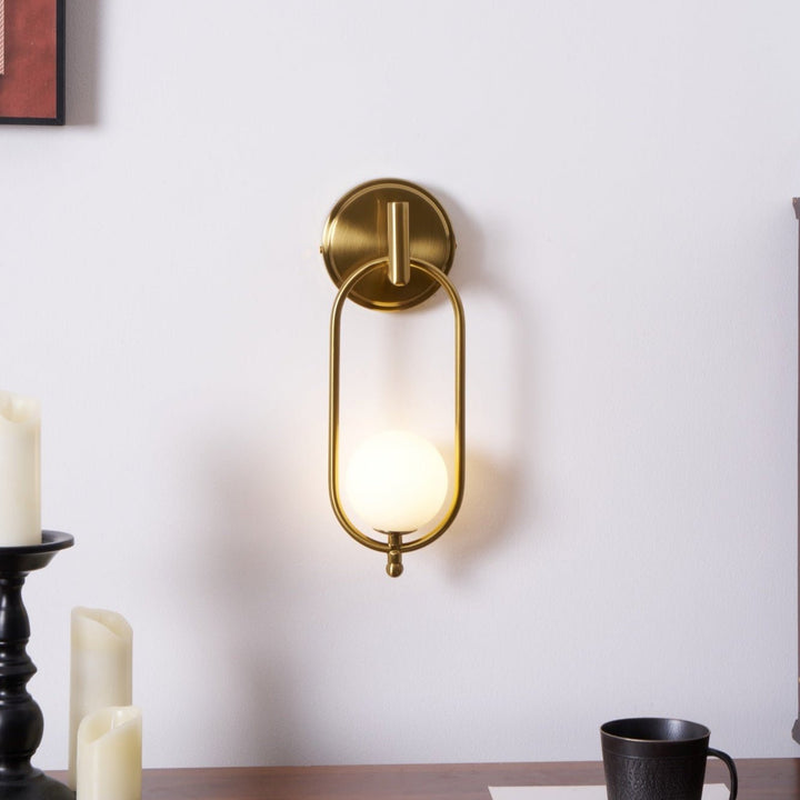 Mosiężna lampa ścienna Aurea