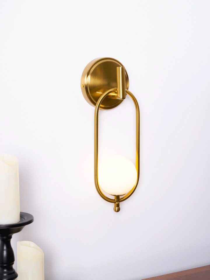 Mosiężna lampa ścienna Aurea