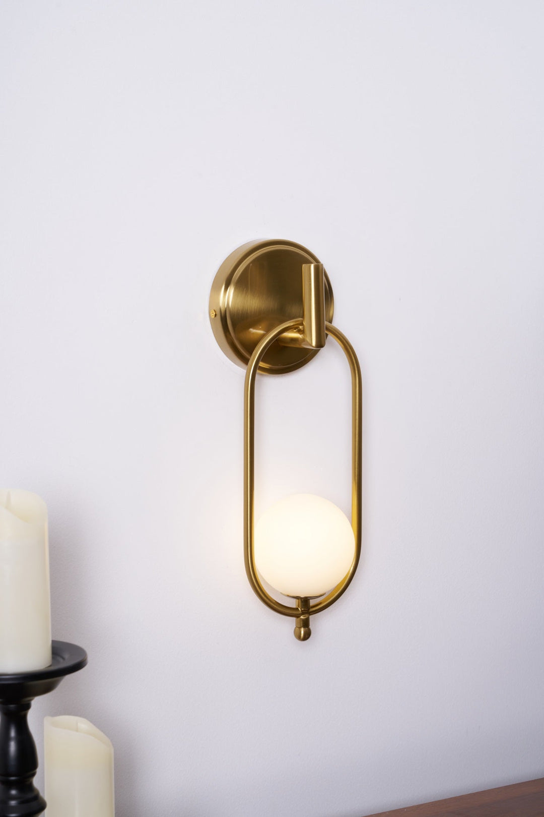 Mosiężna lampa ścienna Aurea