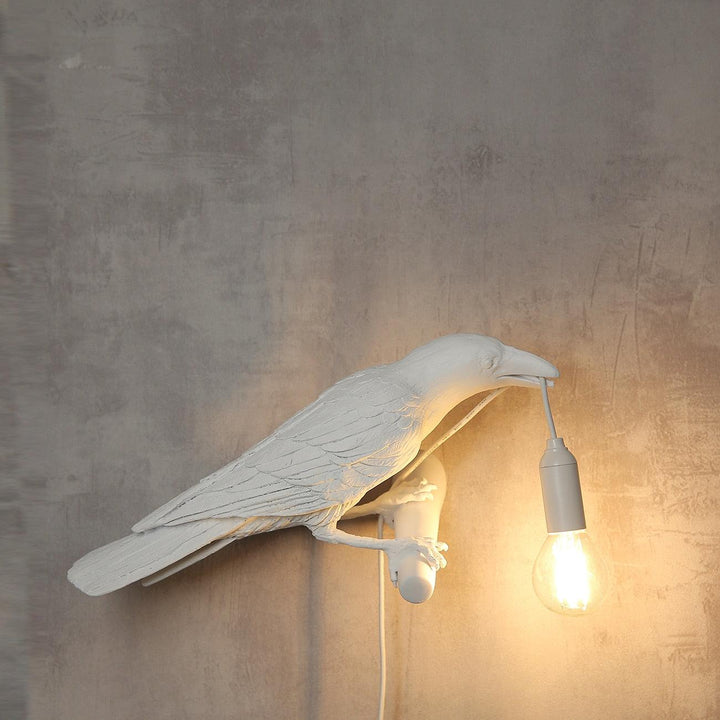Lampa ścienna ptak