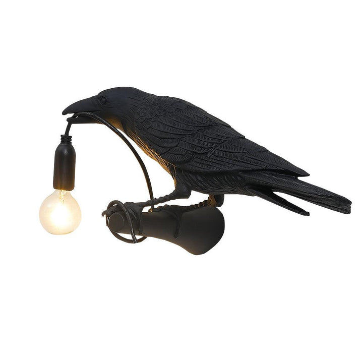 Lampa ścienna ptak