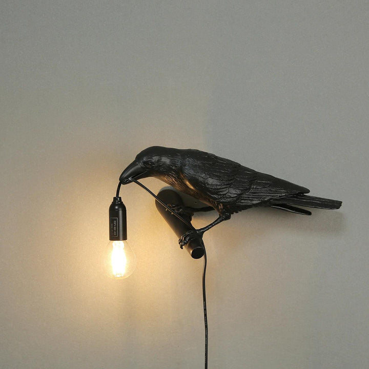 Lampa ścienna ptak