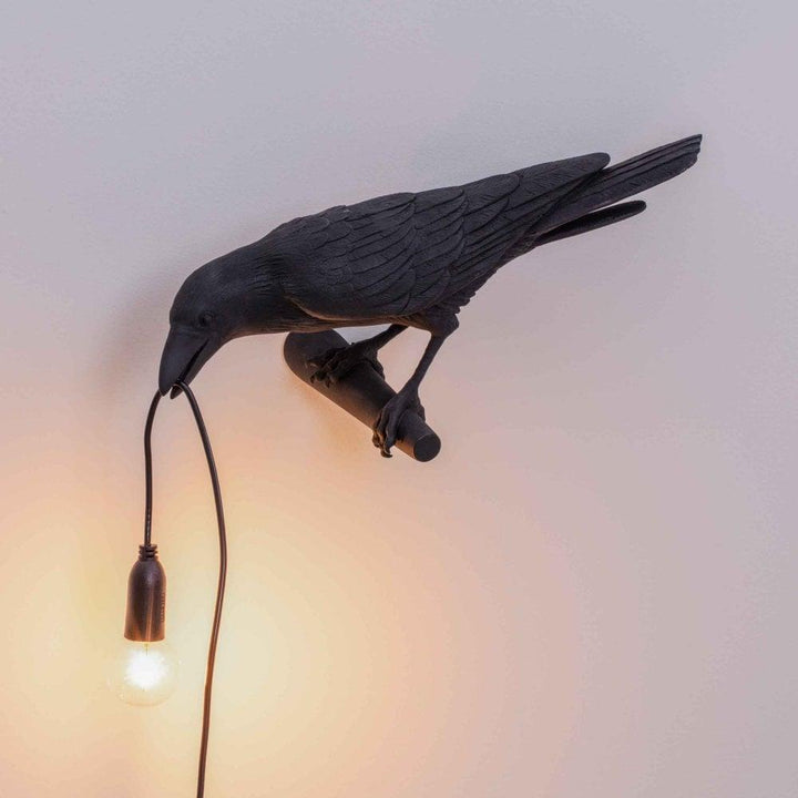 Lampa ścienna ptak