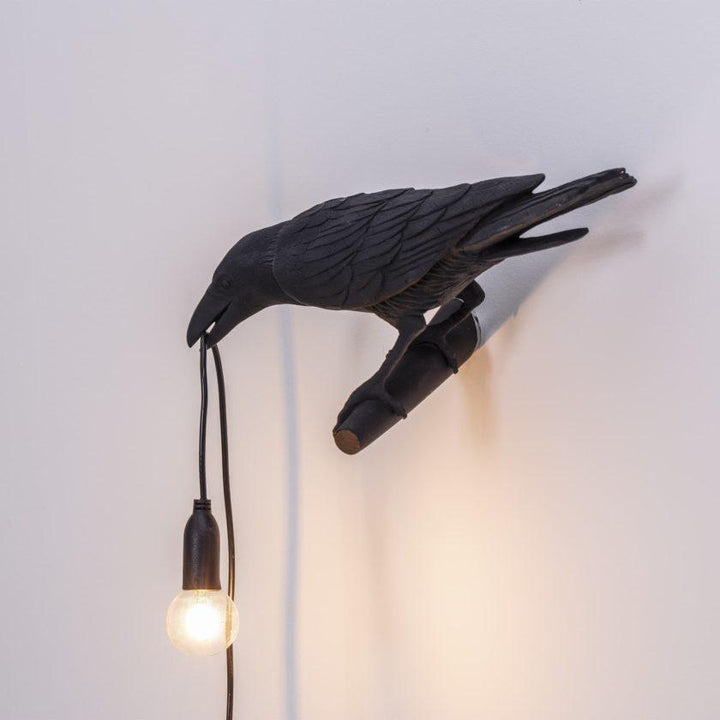 Lampa ścienna ptak