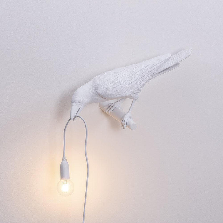 Lampa ścienna ptak