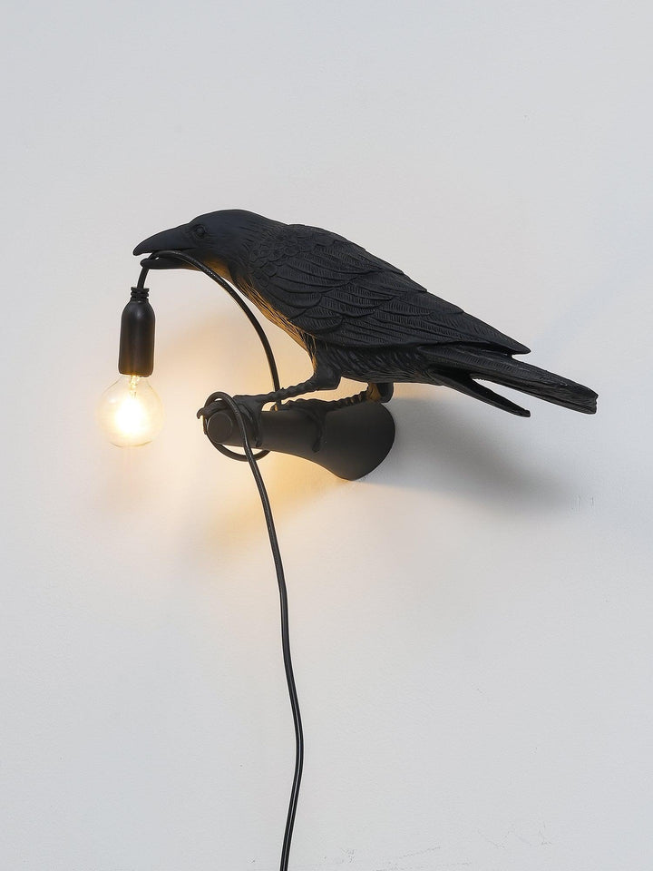 Lampa ścienna ptak