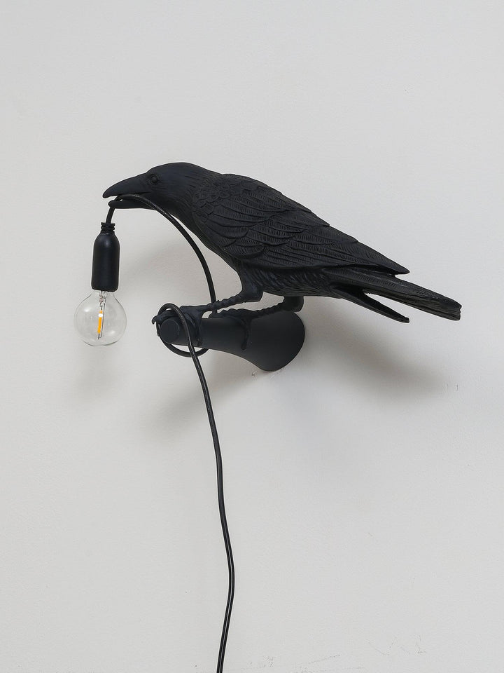 Lampa ścienna ptak