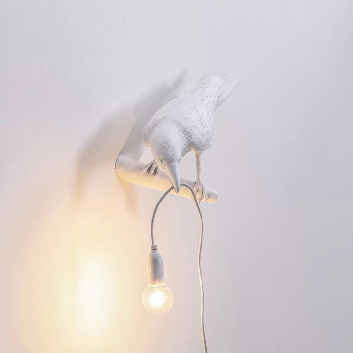 Lampa ścienna ptak