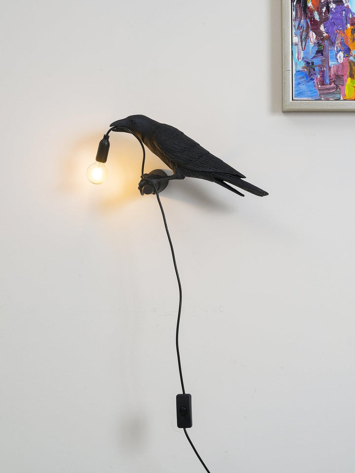 Lampa ścienna ptak