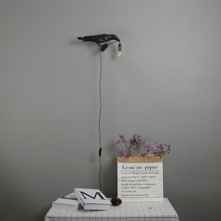 Lampa ścienna ptak