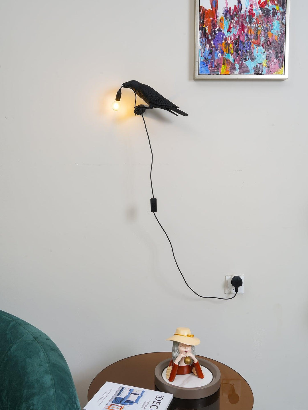 Lampa ścienna ptak