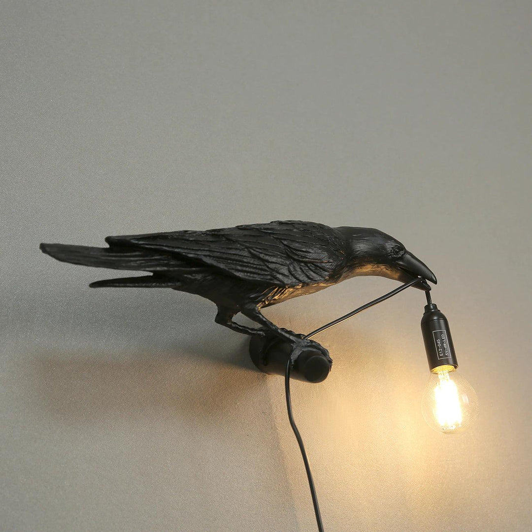 Lampa ścienna ptak