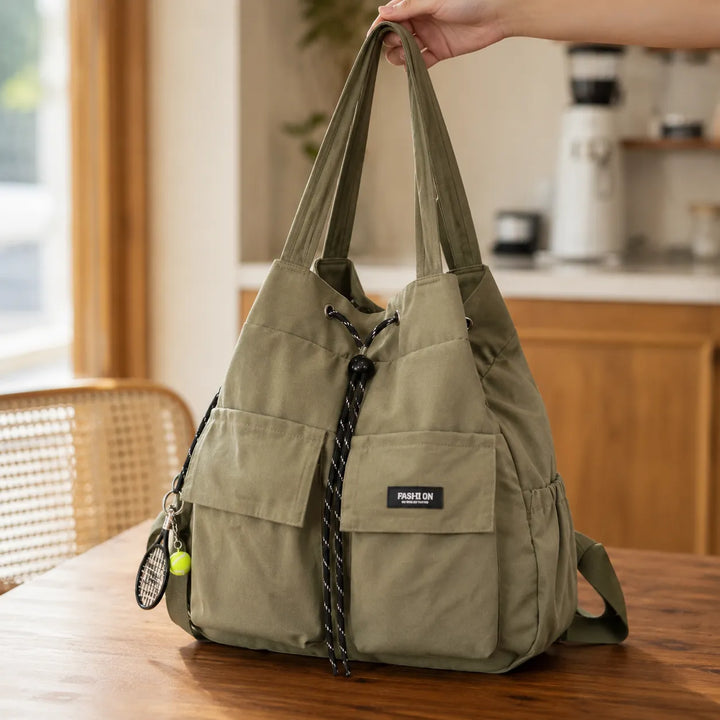 Torba Carryall – Konwertowalna torba z troczkami i plecak z kieszeniami cargo