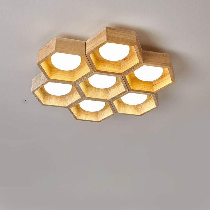 Lampa sufitowa z trawertynu w kształcie plastra miodu