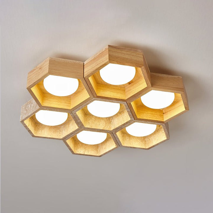 Lampa sufitowa z trawertynu w kształcie plastra miodu