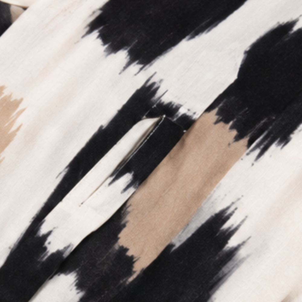 Ruffalia – Tunika z falbaną na dole i dekoltem w serek