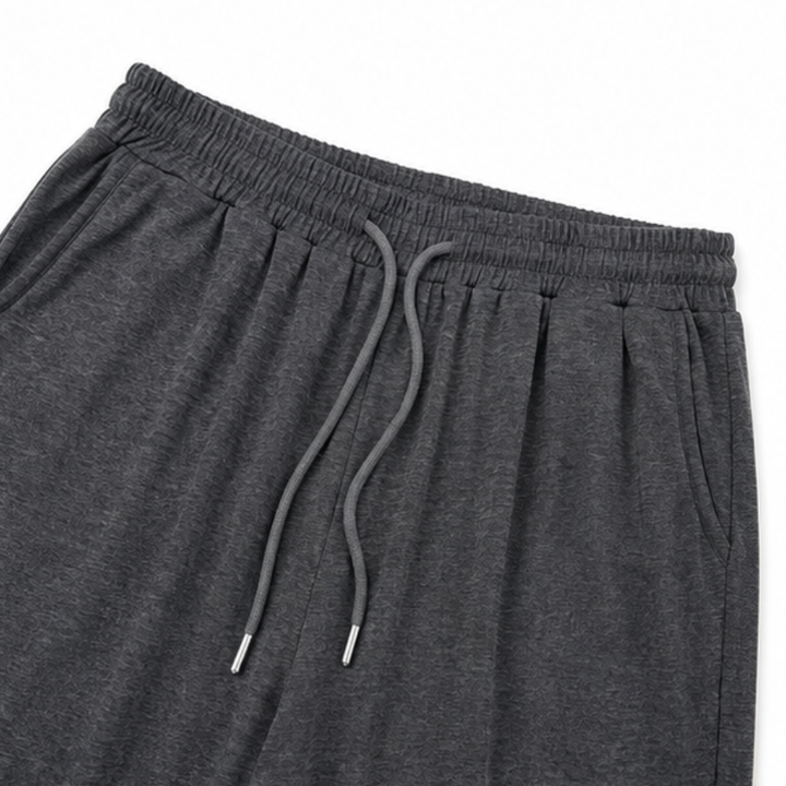 Draperline – Asymetryczna bluzka na jedno ramię i szerokie spodnie