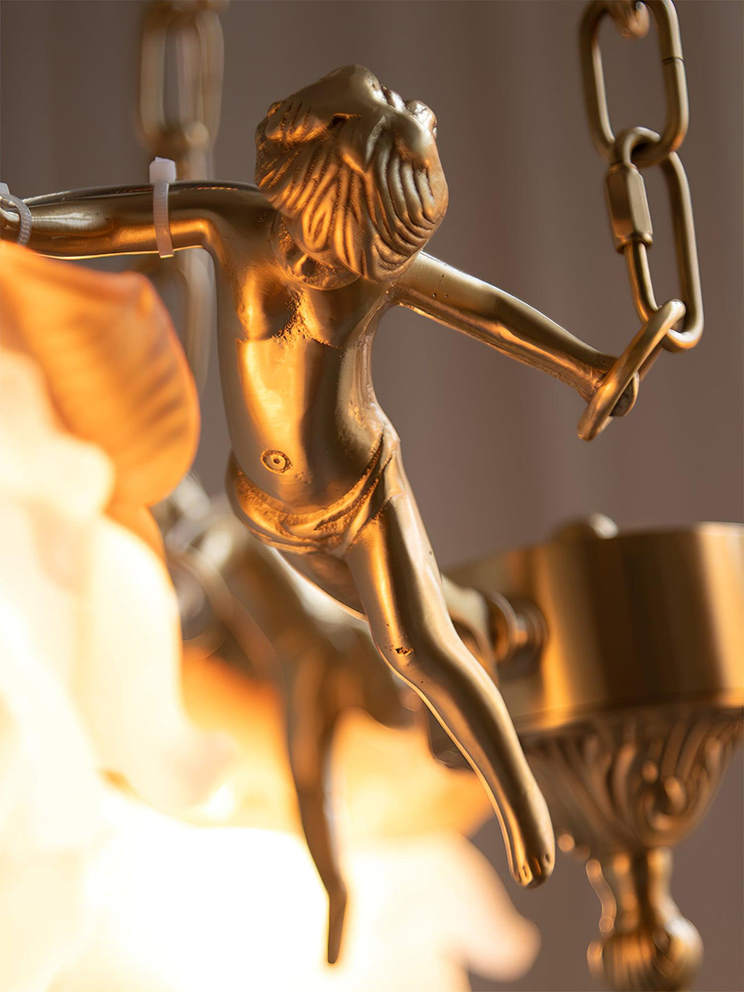 Zawieszenie z brązu z figurkami putti